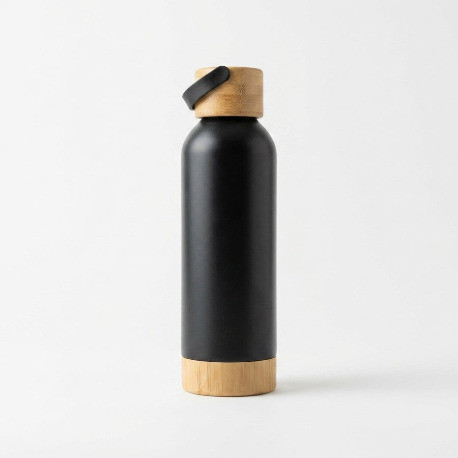 Bamboo Steel Water Bottle in matte black with a bamboo cap and bamboo base, standing on a white background